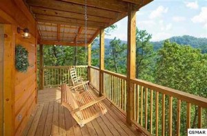 Relax on the spacious porch and take in the ambiance of the mountains and woods.